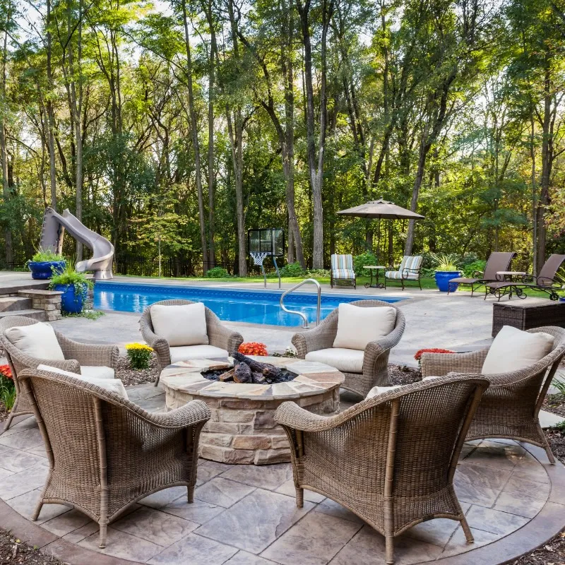 Concrete firepit surround and outdoor seating area