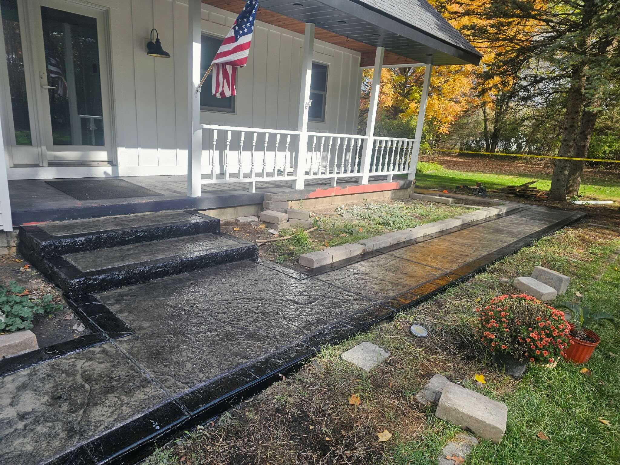 Backyard patio with decorative concrete surface